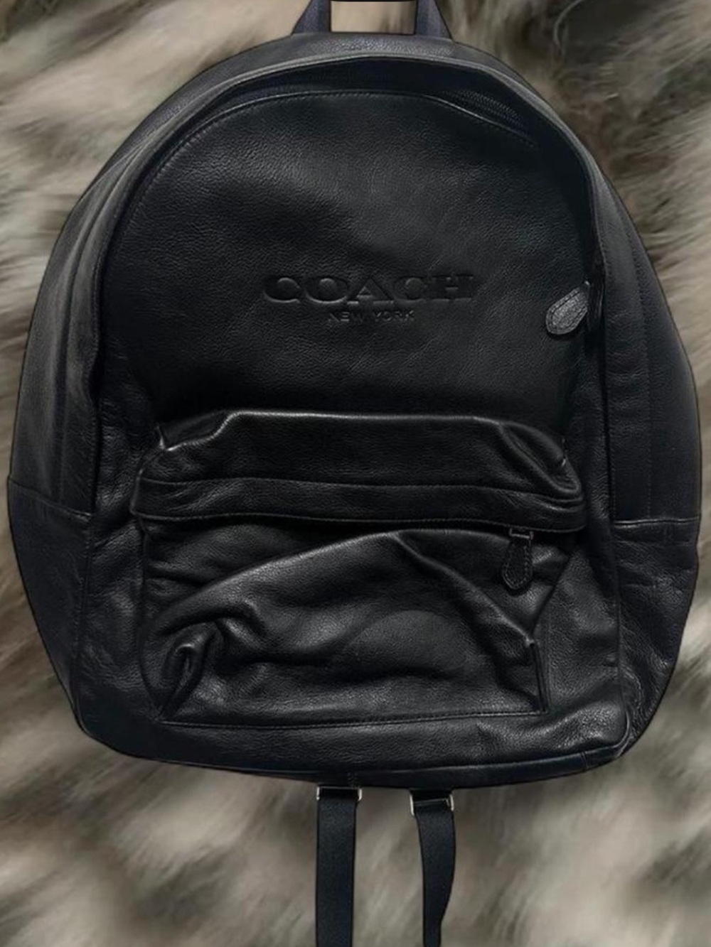 Black Leather Coach backpack